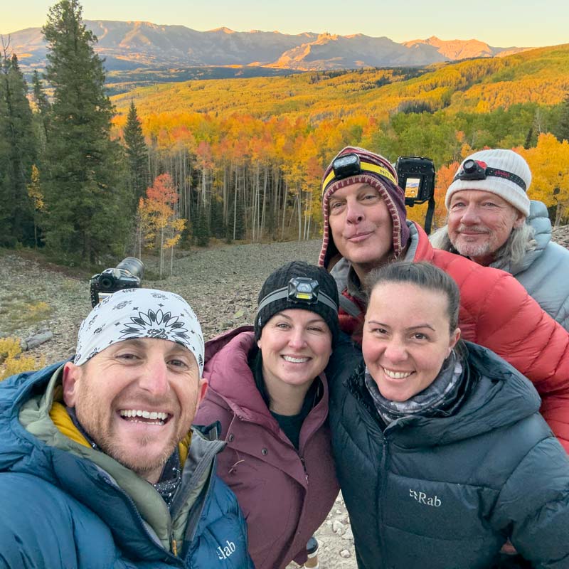 Instructors and students smiling after an epic sunrise during our Fall Colors in Colorado Workshop.
