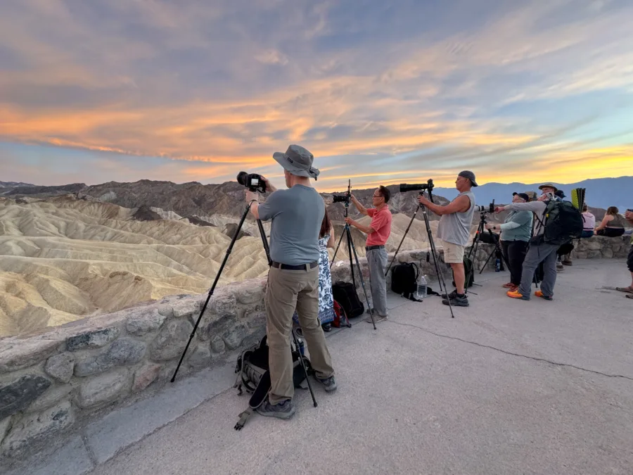 Small photography workshop group photographing the badlands at Zabriskie Point